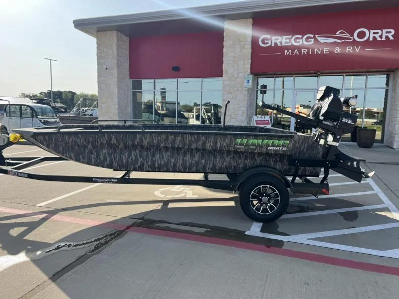 Slide: The Image of 2025 Havoc Boats 1653 MSTC on trailer at Gregg Orr Marine & RV dealership. - 2