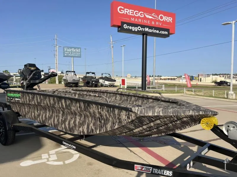 Slide: The Image of 2025 Havoc Boats 1653 MSTC displayed at Gregg Orr Marine dealership. - 7