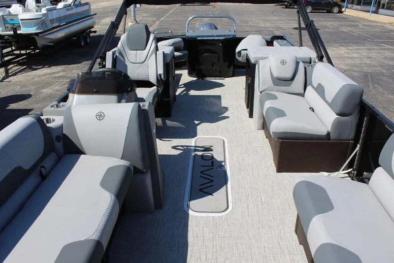 Slide: The Image of Luxurious 2025 Avalon GEO FISH REAR FISH pontoon boat interior with spacious seating. - 13