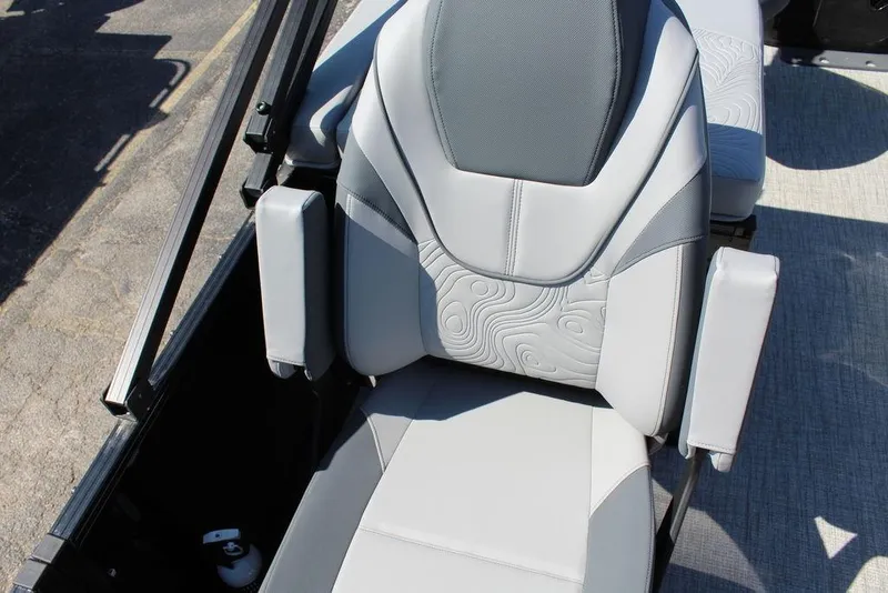 Slide: The Image of 2025 Avalon GEO FISH REAR FISH boat seat with armrests and textured upholstery. - 18