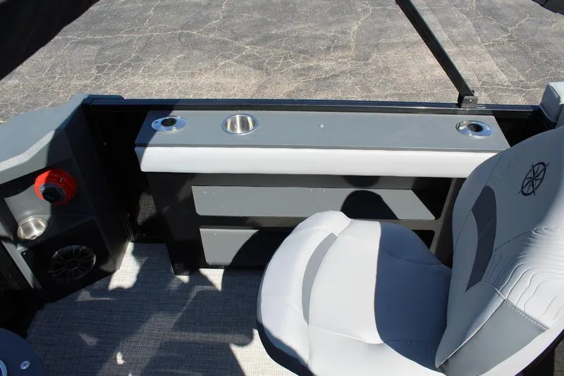 Slide: The Image of 2025 Avalon GEO FISH REAR FISH boat interior with seating and cup holders. - 25