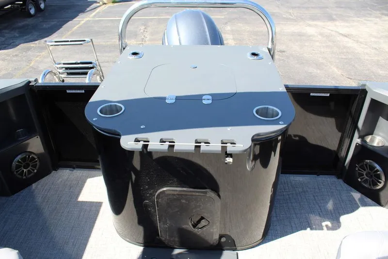 Slide: The Image of 2025 Avalon GEO FISH REAR FISH boat interior with fishing station and cup holders. - 27