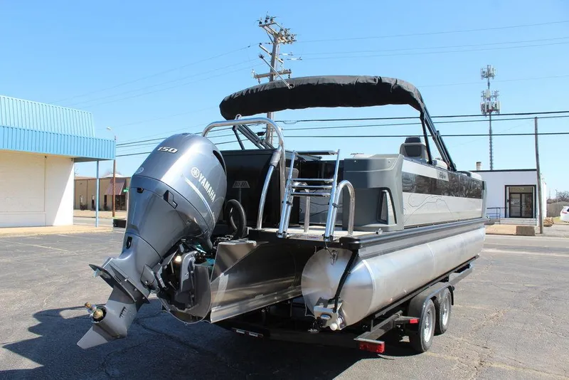 Slide: The Image of 2025 Avalon GEO FISH REAR FISH pontoon boat with Yamaha outboard motor on trailer. - 4