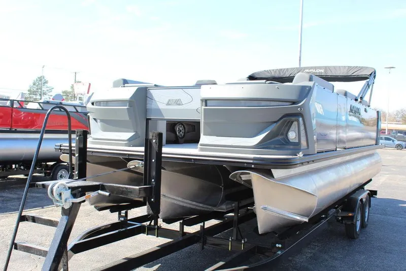 Slide: The Image of 2025 Avalon GEO FISH REAR FISH pontoon boat on trailer, rear view. - 9