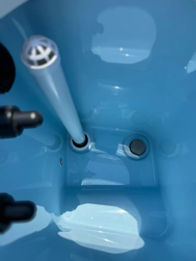 Slide: The Image of 2024 Finseeker 245 WA boat interior detail, featuring a blue compartment with fixtures. - 8