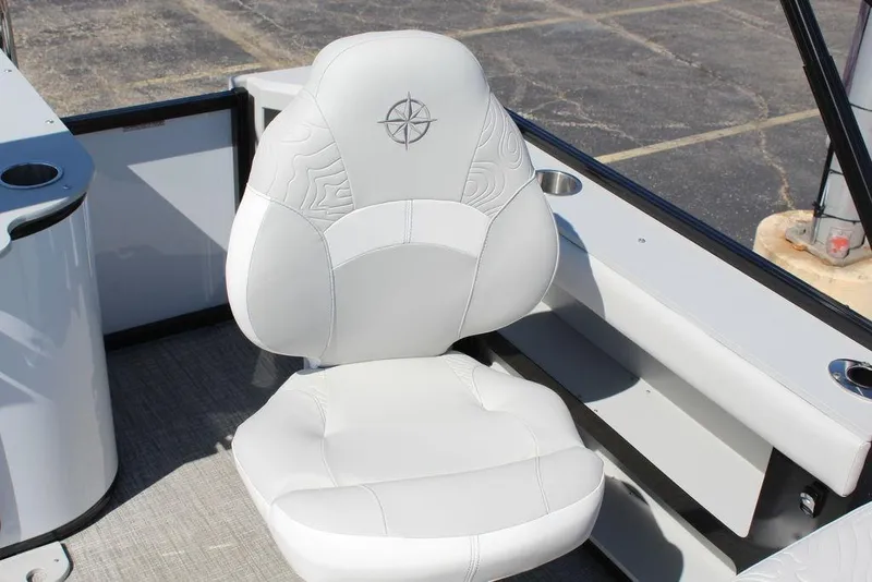 Slide: The Image of White cushioned seat on 2025 Avalon GEO FISH REAR FISH boat, featuring a compass design. - 14