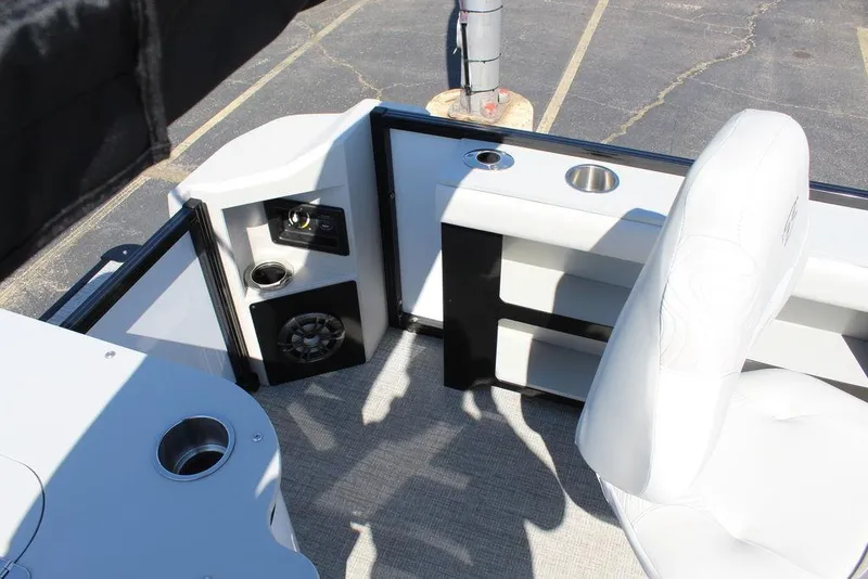 Slide: The Image of Interior of 2025 Avalon GEO FISH REAR FISH boat with seating and cup holders. - 15