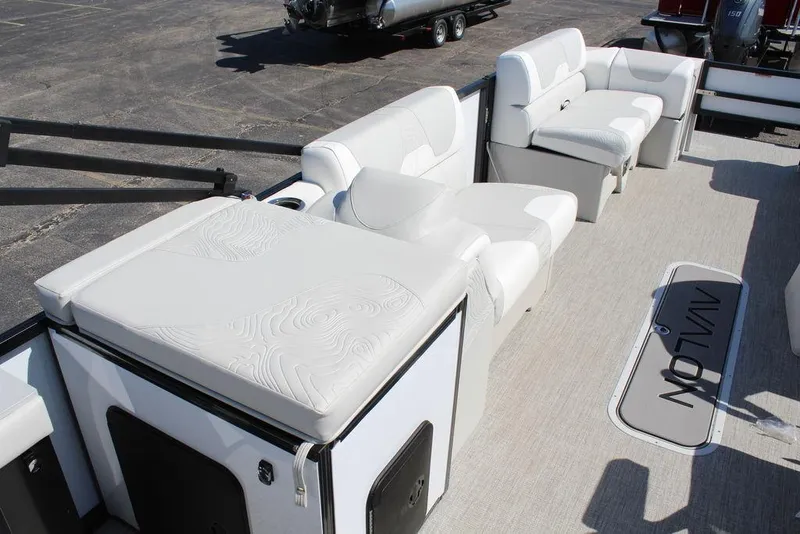 Slide: The Image of 2025 Avalon GEO FISH REAR FISH boat interior with white seating and spacious layout. - 18