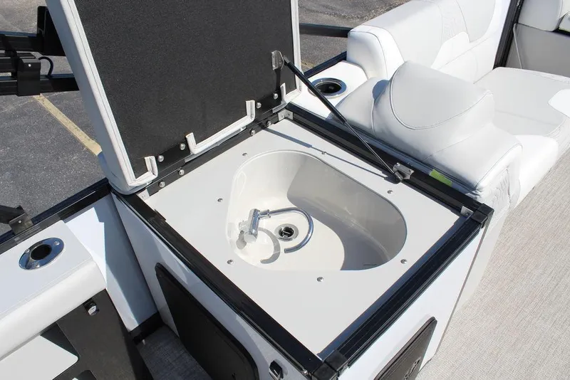 Slide: The Image of 2025 Avalon GEO FISH REAR FISH boat with open livewell and seating area. - 21