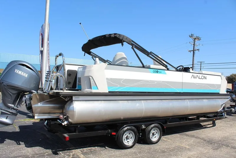 Slide: The Image of 2025 Avalon GEO FISH REAR FISH pontoon boat with Yamaha engine on trailer. - 3