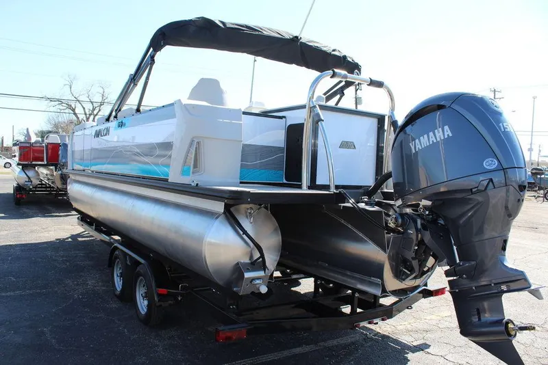 Slide: The Image of 2025 Avalon GEO FISH REAR FISH pontoon boat with Yamaha outboard motor on trailer. - 5