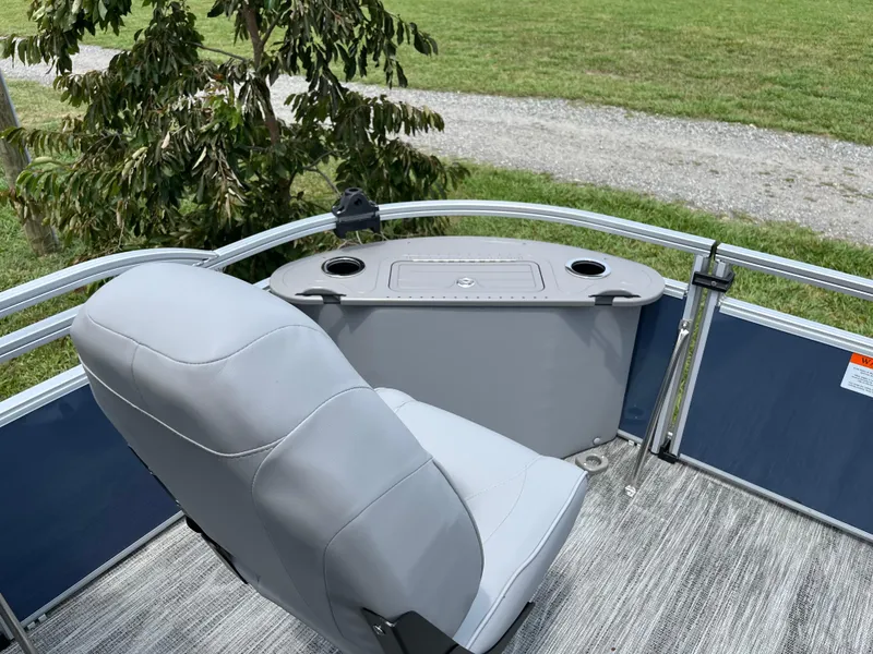Slide: The Image of 2024 Landau A'Lure 212 Fishing boat with gray seating and console, outdoor setting. - 10