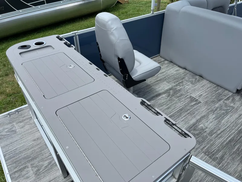 Slide: The Image of 2024 Landau A'Lure 212 Fishing boat interior with seating and storage compartments. - 14