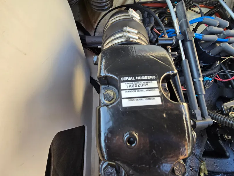 Slide: The Image of Engine compartment of a 2008 Sea Ray 205 Sport boat, showing serial numbers and wiring. - 23