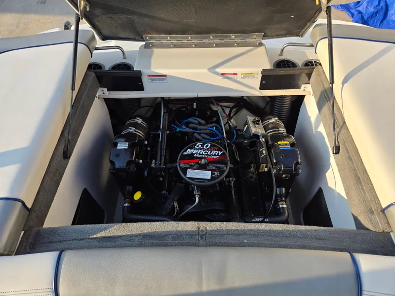 Slide: The Image of 2008 Sea Ray 205 Sport boat engine compartment with 5.0 MerCruiser engine. - 26