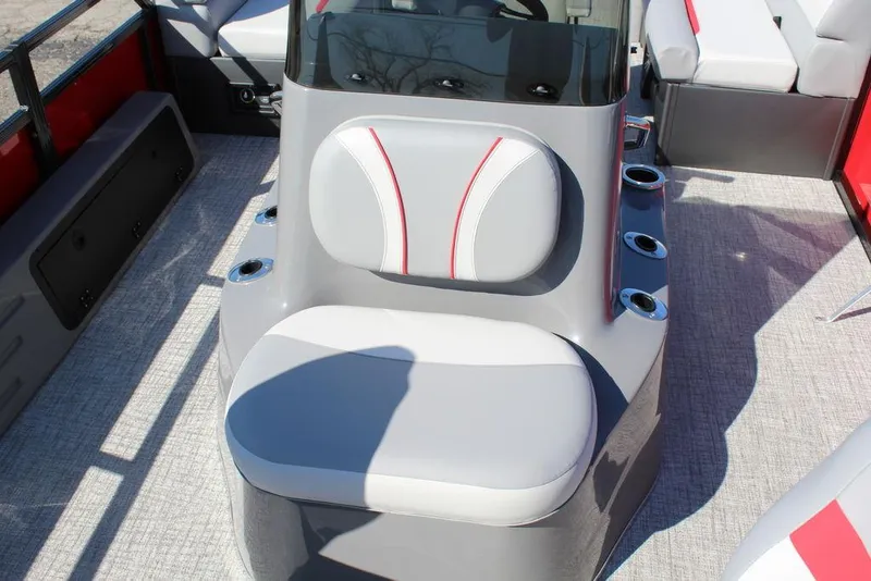 Slide: The Image of 2025 Avalon Venture 85 Center Console Fish boat interior with seating and cup holders. - 11