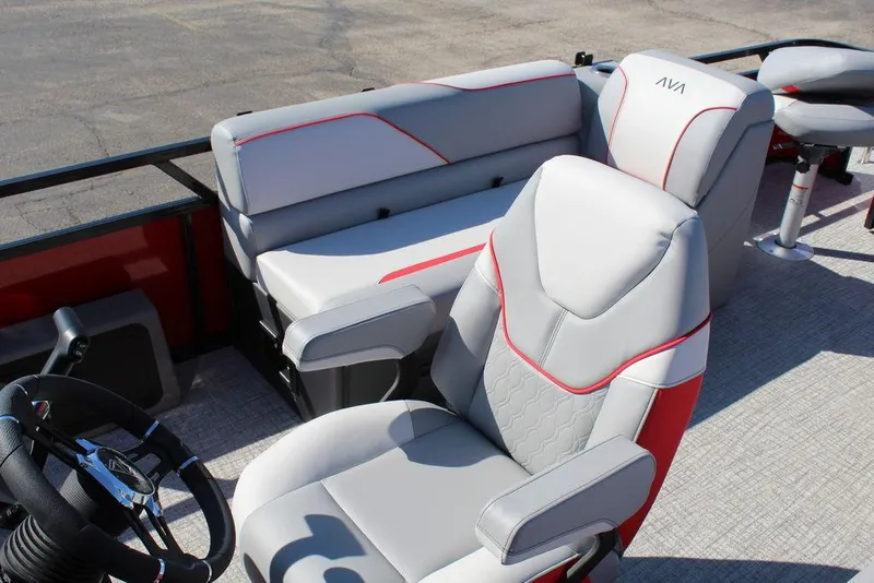 Slide: The Image of 2025 Avalon Venture 85 Center Console Fish boat interior with modern seating and steering wheel. - 13