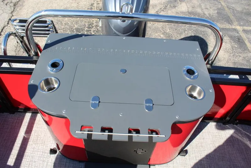 Slide: The Image of 2025 Avalon Venture 85 Center Console Fish, red and gray deck with cup holders. - 16