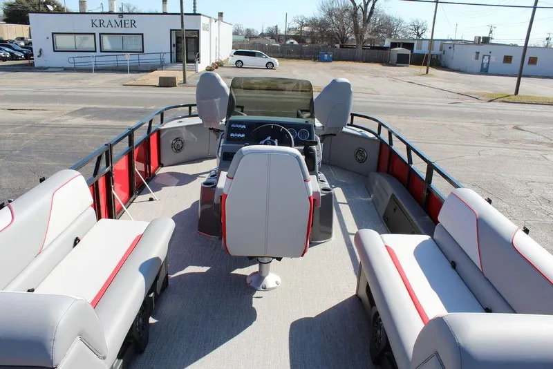 Slide: The Image of 2025 Avalon Venture 85 Center Console Fish boat interior with seating and steering console. - 18