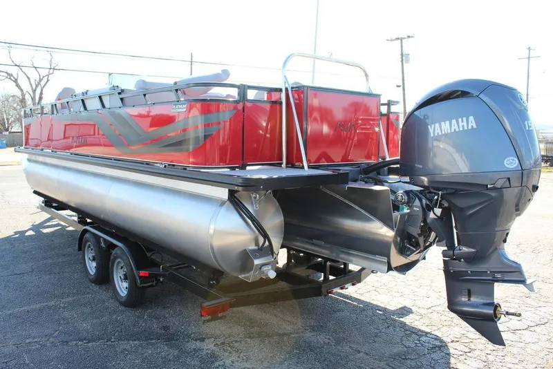 Slide: The Image of 2025 Avalon Venture 85 Center Console Fish boat, red exterior, Yamaha engine, on trailer. - 4