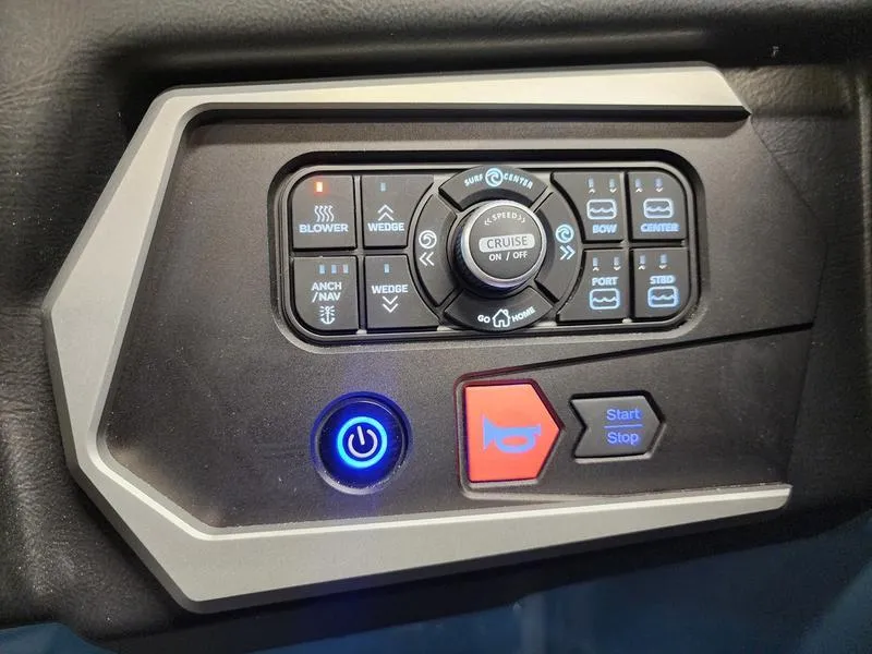 Slide: The Image of Control panel of 2025 Axis T235 boat with various function buttons and indicators. - 17