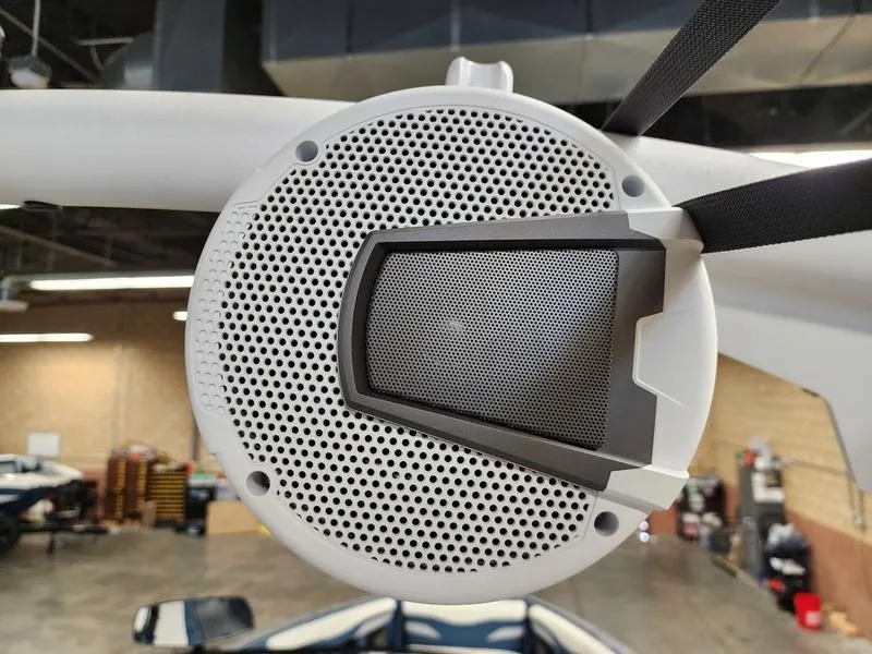 Slide: The Image of 2025 Axis T235 boat speaker in a showroom setting. - 24