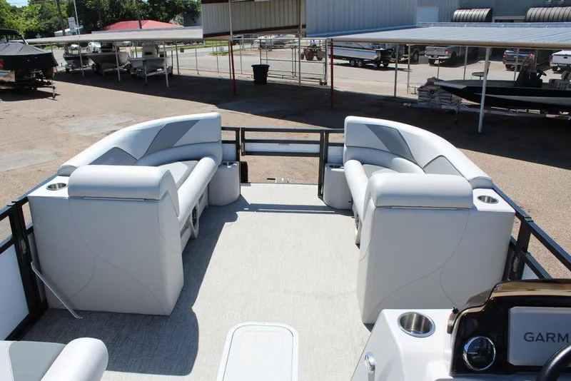 Slide: The Image of 2025 Avalon Venture 85 Rear Fish 23 FT pontoon boat interior with plush seating. - 17