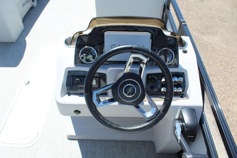 Slide: The Image of Steering console of 2025 Avalon Venture 85 Rear Fish 23 FT boat. - 23