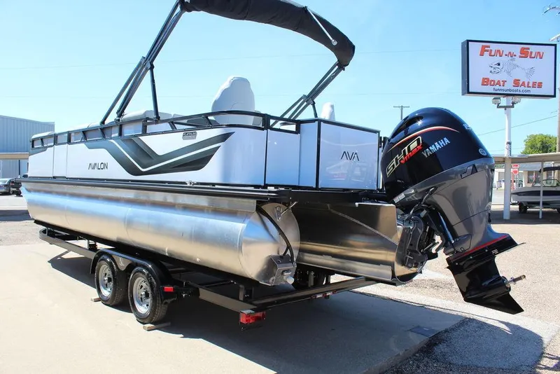 Slide: The Image of 2025 Avalon Venture 85 Rear Fish 23 FT pontoon boat with Yamaha engine at dealership. - 4