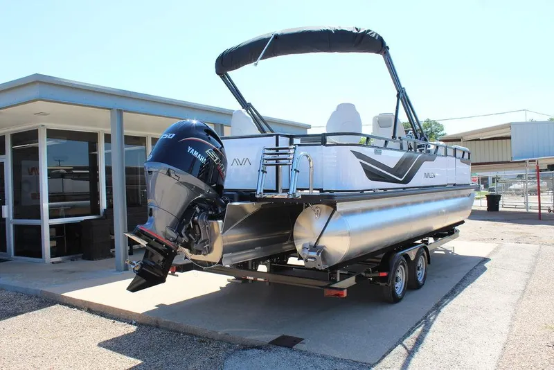 Slide: The Image of 2025 Avalon Venture 85 Rear Fish 23 FT pontoon boat with Yamaha engine on trailer. - 7