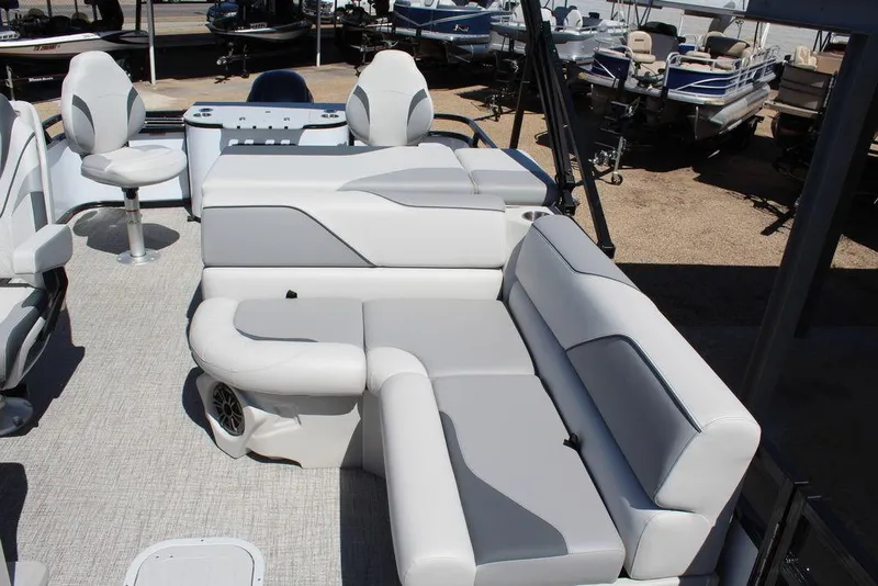Slide: The Image of 2025 Avalon Venture 85 Rear Fish 23 FT boat interior with plush seating and modern design. - 8