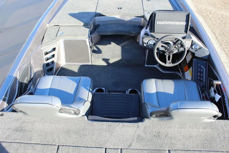 Slide: The Image of 2025 Skeeter ZXR20 boat interior with dual seats and Humminbird navigation system. - 11