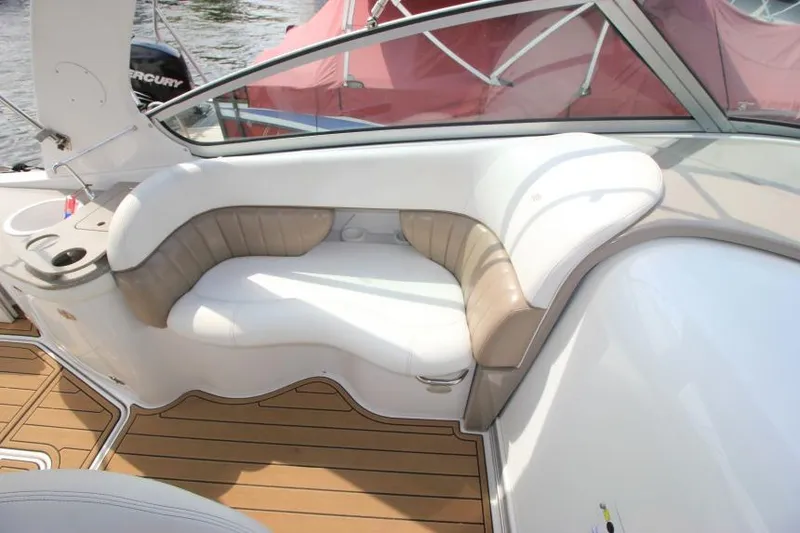 Slide: The Image of 2004 Four Winns 288 Vista boat interior with white and beige seating. - 34