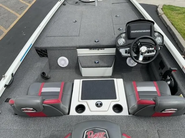 Slide: The Image of 2020 Ranger RT198P boat interior with steering console and seating. - 10