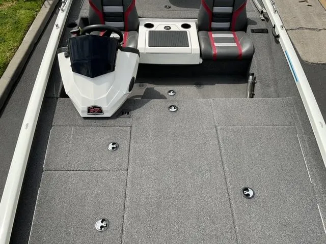 Slide: The Image of 2020 Ranger RT198P boat interior with steering console and seating. - 12