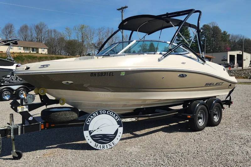 Slide: The Image of 2007 Sea Ray 210 Select boat on trailer at Coast to Coast Marine dealership. - 0