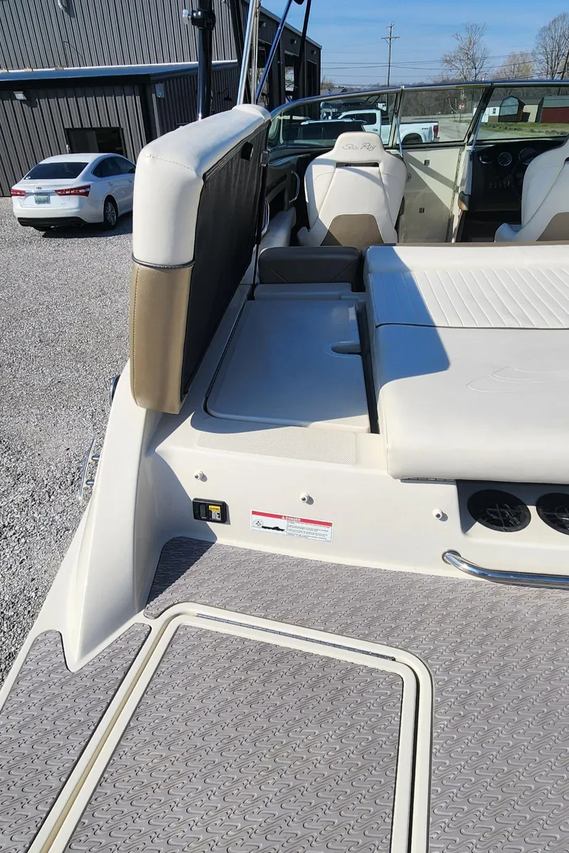 Slide: The Image of 2007 Sea Ray 210 Select boat interior with seating and deck details. - 16