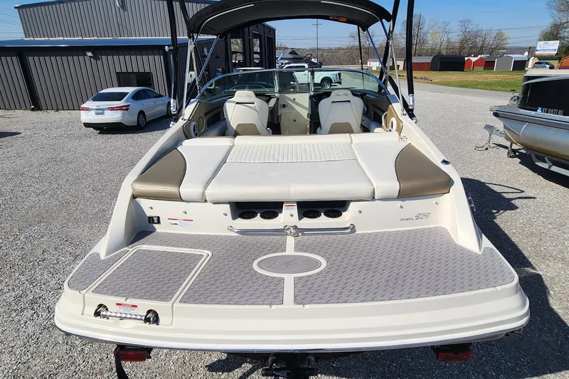 Slide: The Image of 2007 Sea Ray 210 Select boat, rear view, showcasing seating and swim platform. - 5