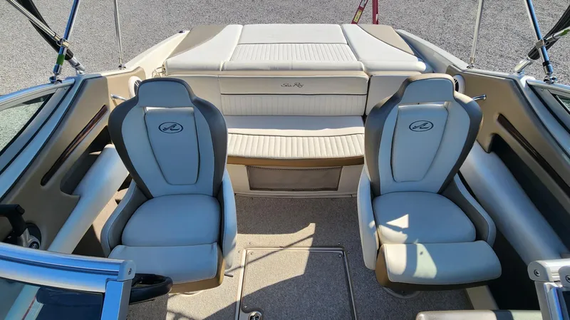 Slide: The Image of 2007 Sea Ray 210 Select boat interior with two seats and rear bench. - 8