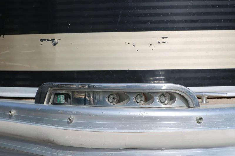 Slide: The Image of 2010 Bennington 2275 GLI boat detail with metallic trim and light fixtures. - 36