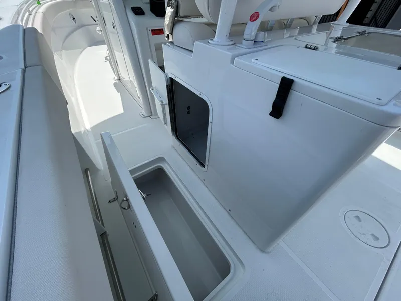 Slide: The Image of 2025 Sea Hunt Gamefish 28 boat interior with coffin box storage. - 12