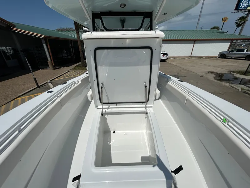 Slide: The Image of 2025 Sea Hunt Gamefish 28 with Coffin Box, showcasing spacious storage area on deck. - 19