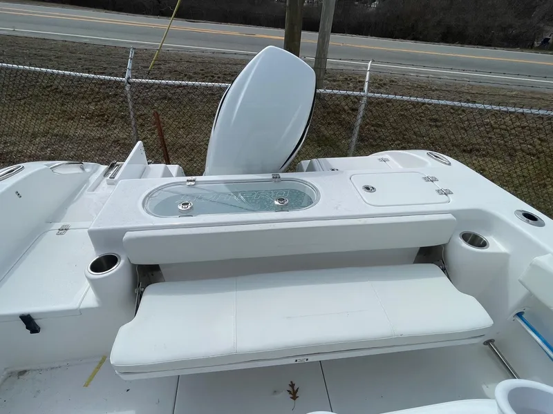 Slide: The Image of 2025 Sea Pro 242 Center Console boat with seating and storage compartments. - 26