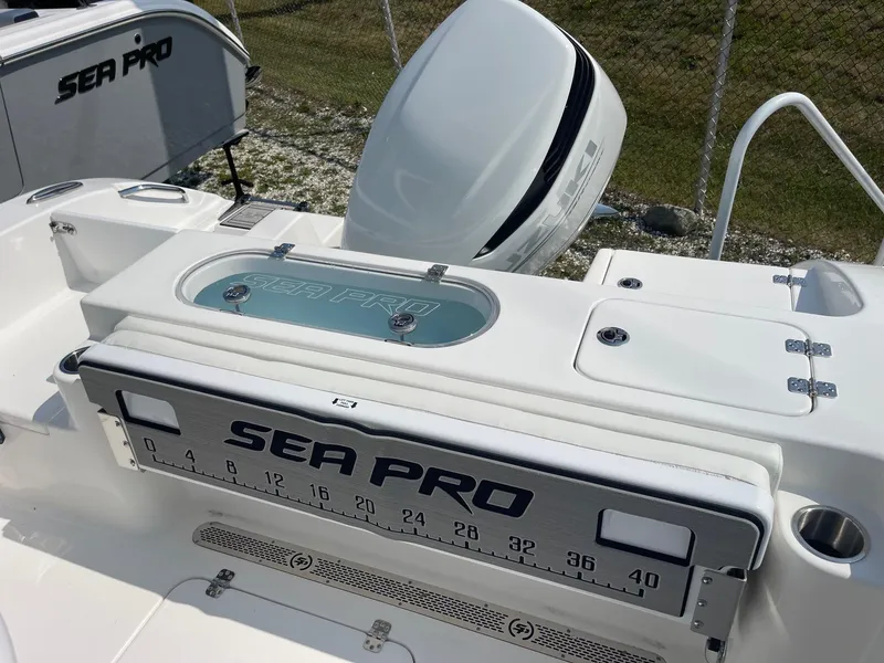 Slide: The Image of 2025 Sea Pro 242 Center Console boat with fishing ruler and storage compartments. - 30