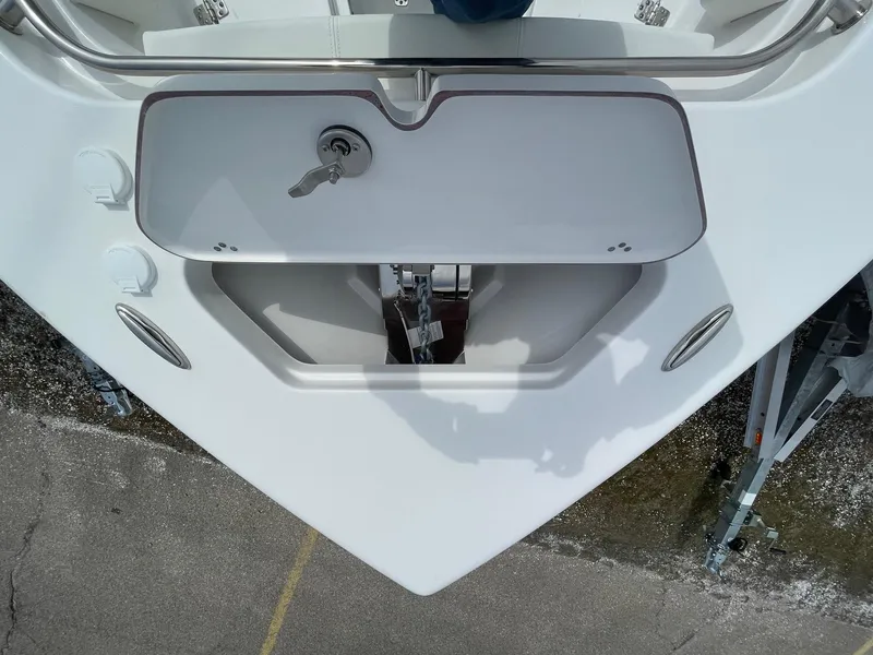 Slide: The Image of Bow view of 2025 Sea Pro 242 Center Console boat, featuring anchor storage. - 31