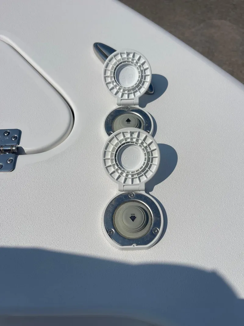 Slide: The Image of 2025 Sea Pro 242 Center Console boat deck with circular fittings. - 44