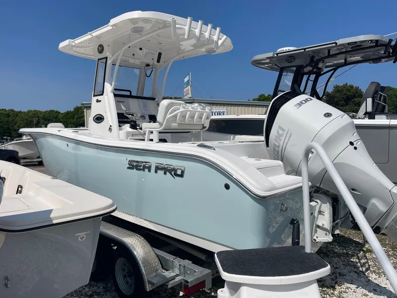 Slide: The Image of 2025 Sea Pro 242 Center Console boat on display, featuring sleek design and powerful engine. - 6