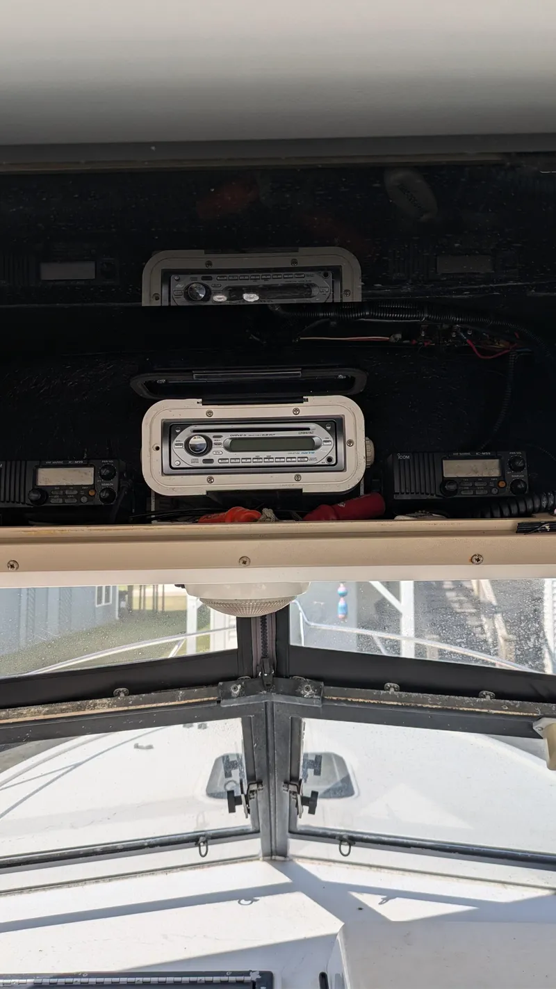 Slide: The Image of 1996 Albemarle 275 Express boat interior with electronic equipment. - 12