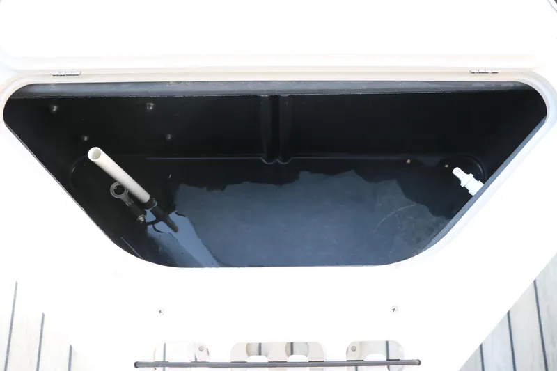Slide: The Image of Open storage compartment in 2017 Berkshire 211RFC CTS boat. - 24