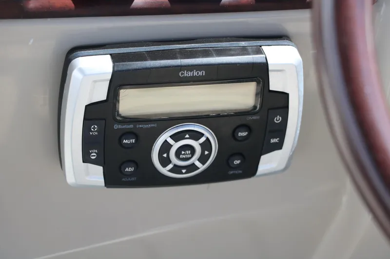 Slide: The Image of Clarion audio control panel in a 2017 Berkshire 211RFC CTS boat. - 29